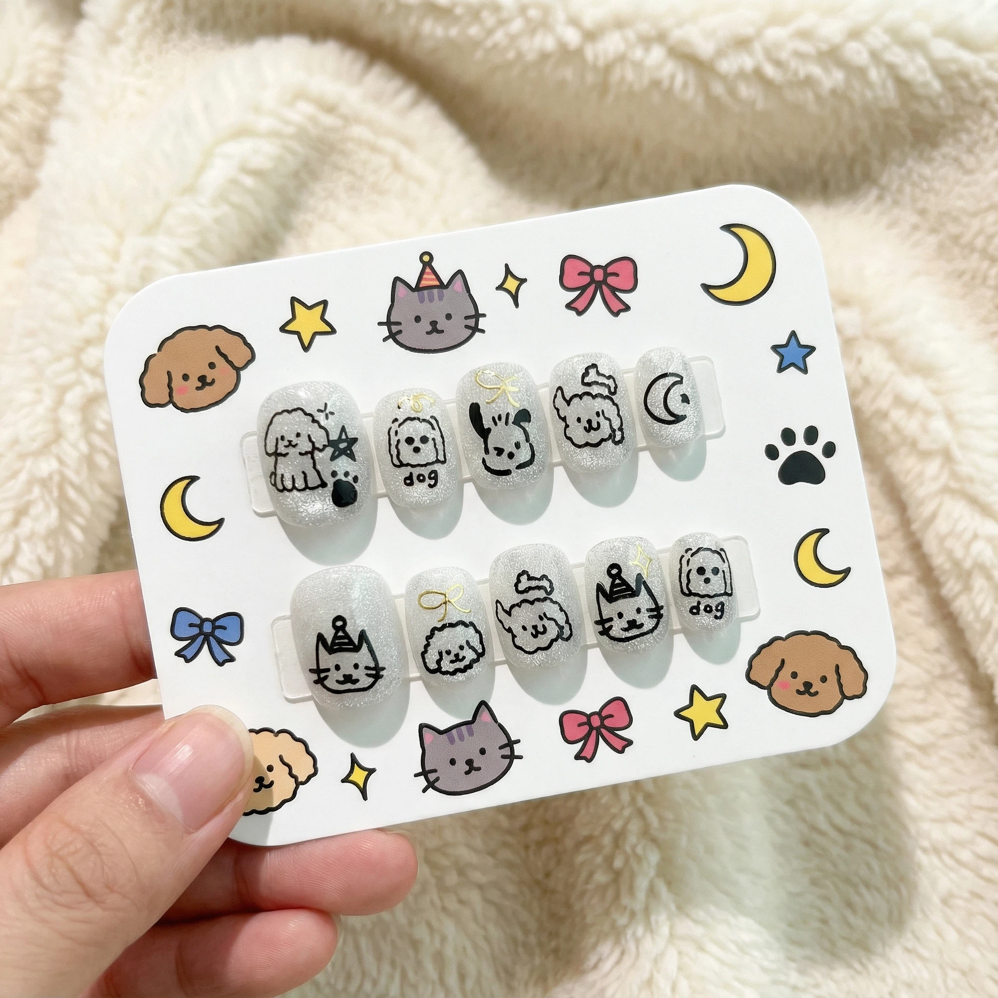 Cute cat doodle press-on nails set on display card, black line art on milky white short nails