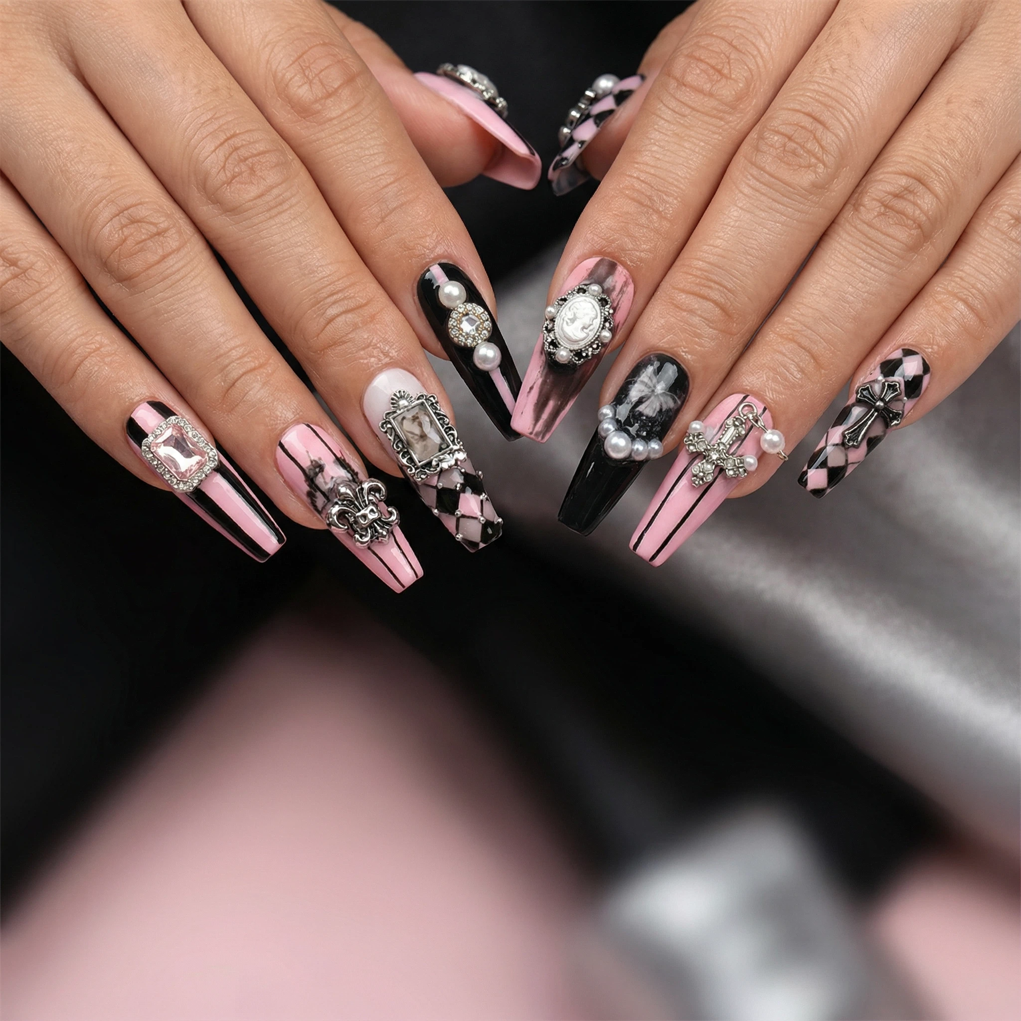 Pink black press-on nails with checkered accents and crystal details, salon look in minutes