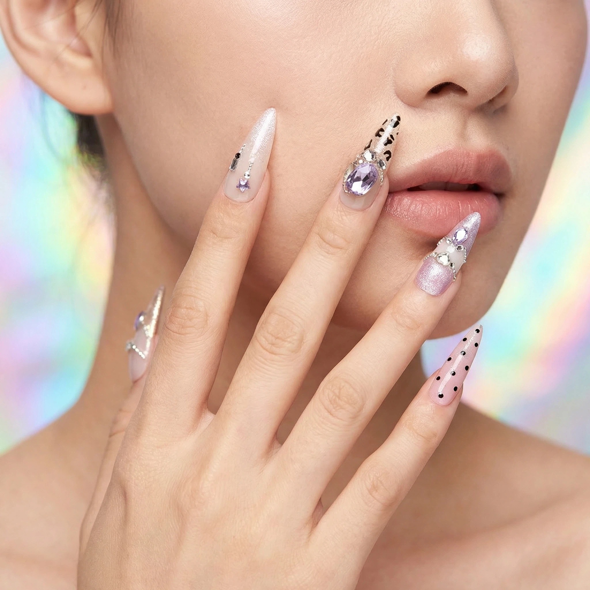 Icy silver gradient press-on nails with crystals, coffee cup lifestyle shot