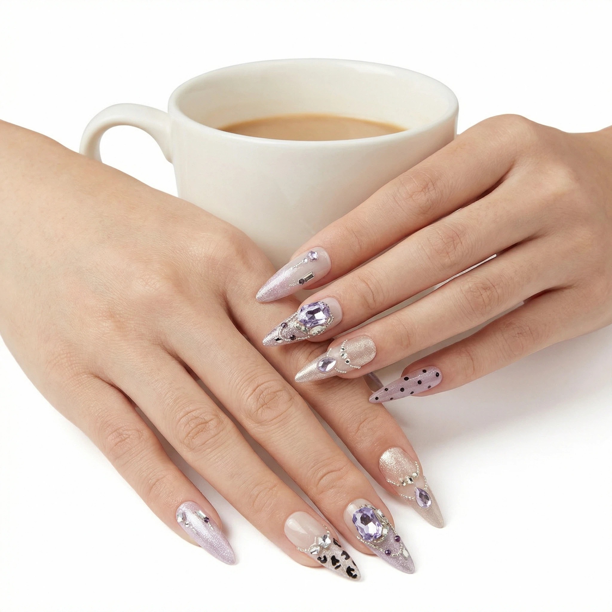 Model wearing silver ombré crystal stiletto press-on nails close-up