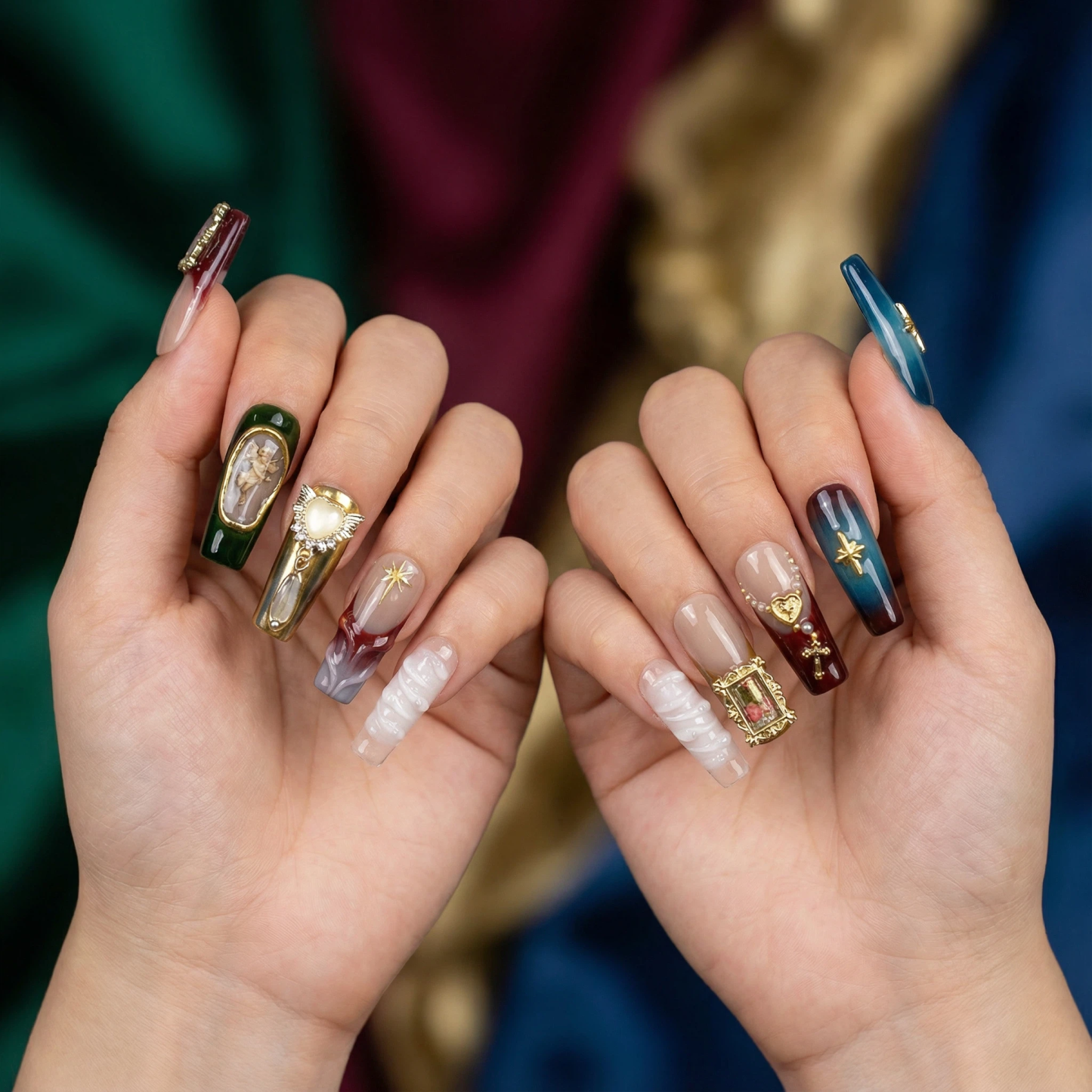 alt="Model wearing vintage angel press on nails with gold frame, moon and star charms on both hands"