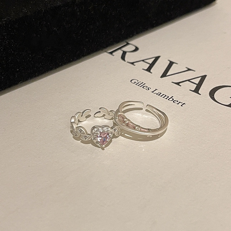 Silver pink heart rhinestone 2-piece ring set displayed on a light background