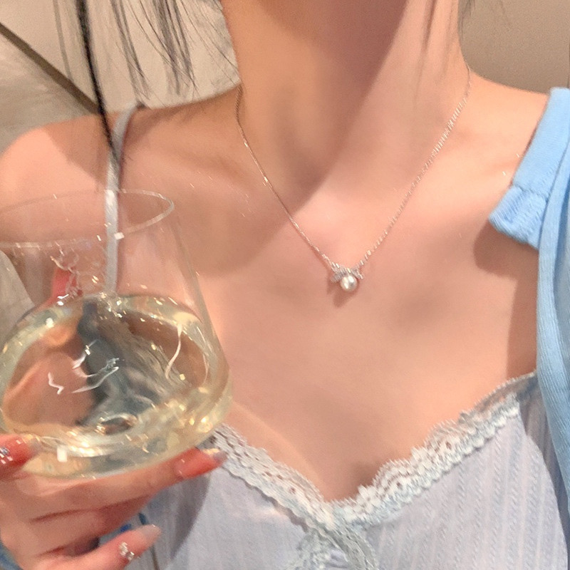 Silver Bow Faux Pearl Pendant Necklace