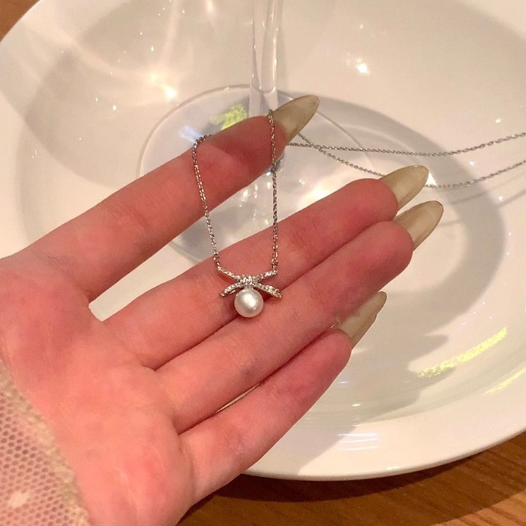 Silver Bow Faux Pearl Pendant Necklace