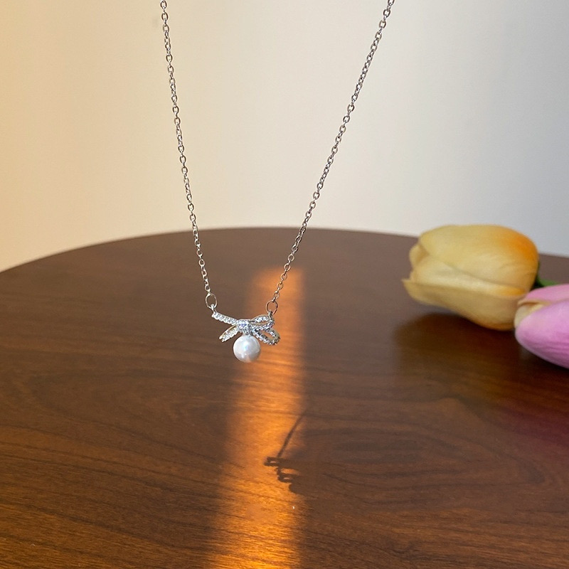 Silver Bow Faux Pearl Pendant Necklace