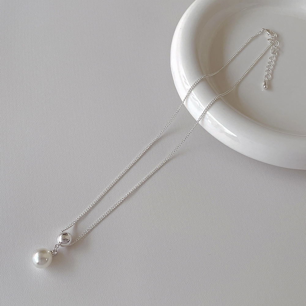 Silver ball faux pearl pendant necklace with delicate chain and adjustable clasp