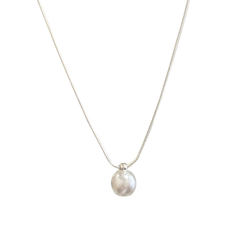Silver minimalist faux pearl pendant necklace on a clean white background
