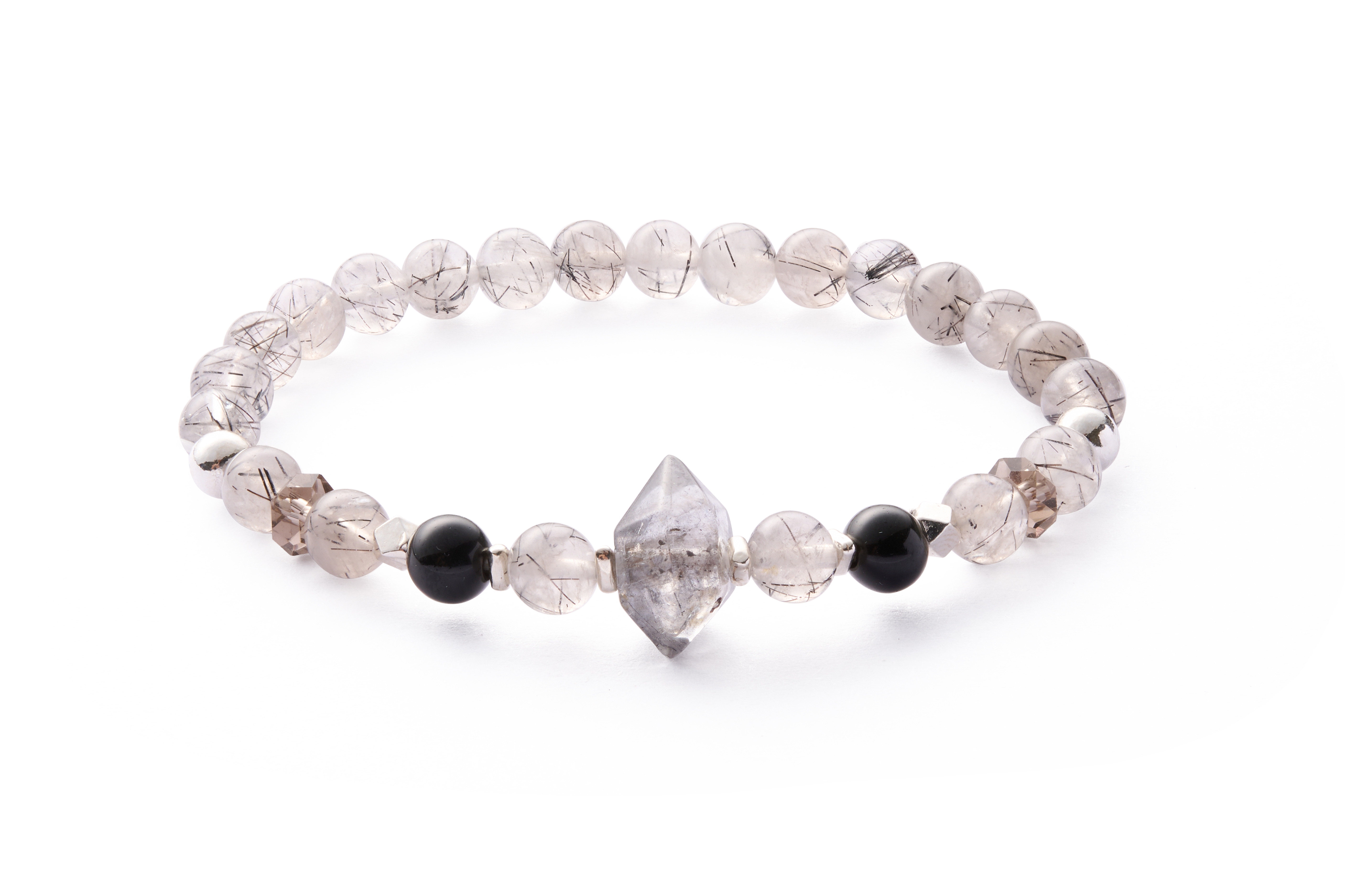 Macro bead detail — natural inclusions, clear quartz separators and small metal spacer visible