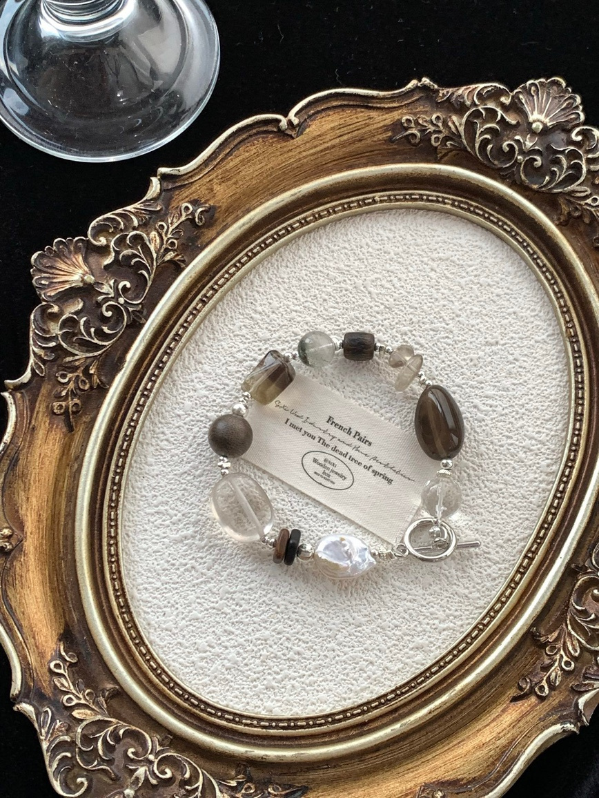 Crystal and pearl bracelet framed in vintage gold jewelry frame