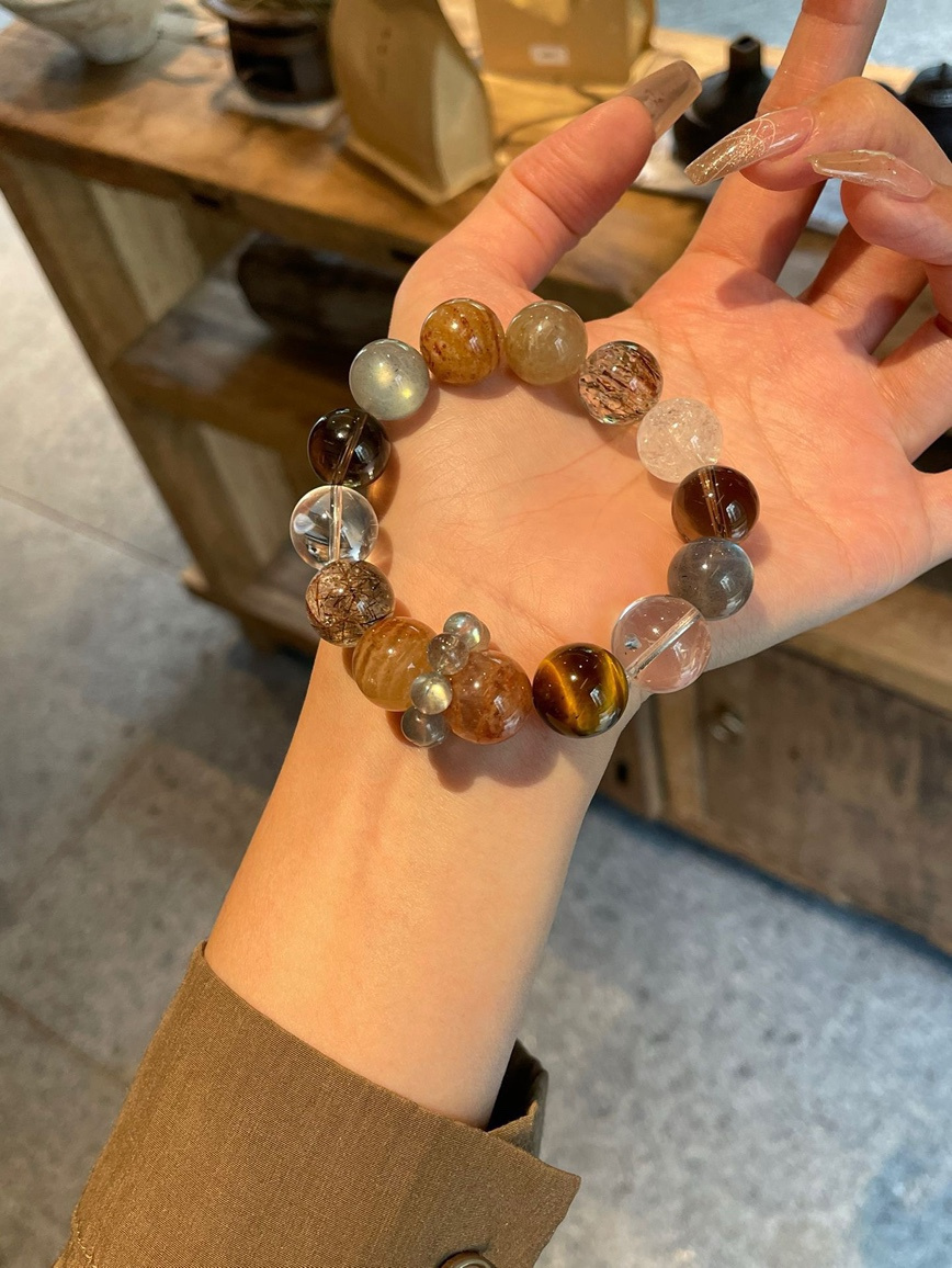 Crystal bracelet glowing under warm indoor lighting