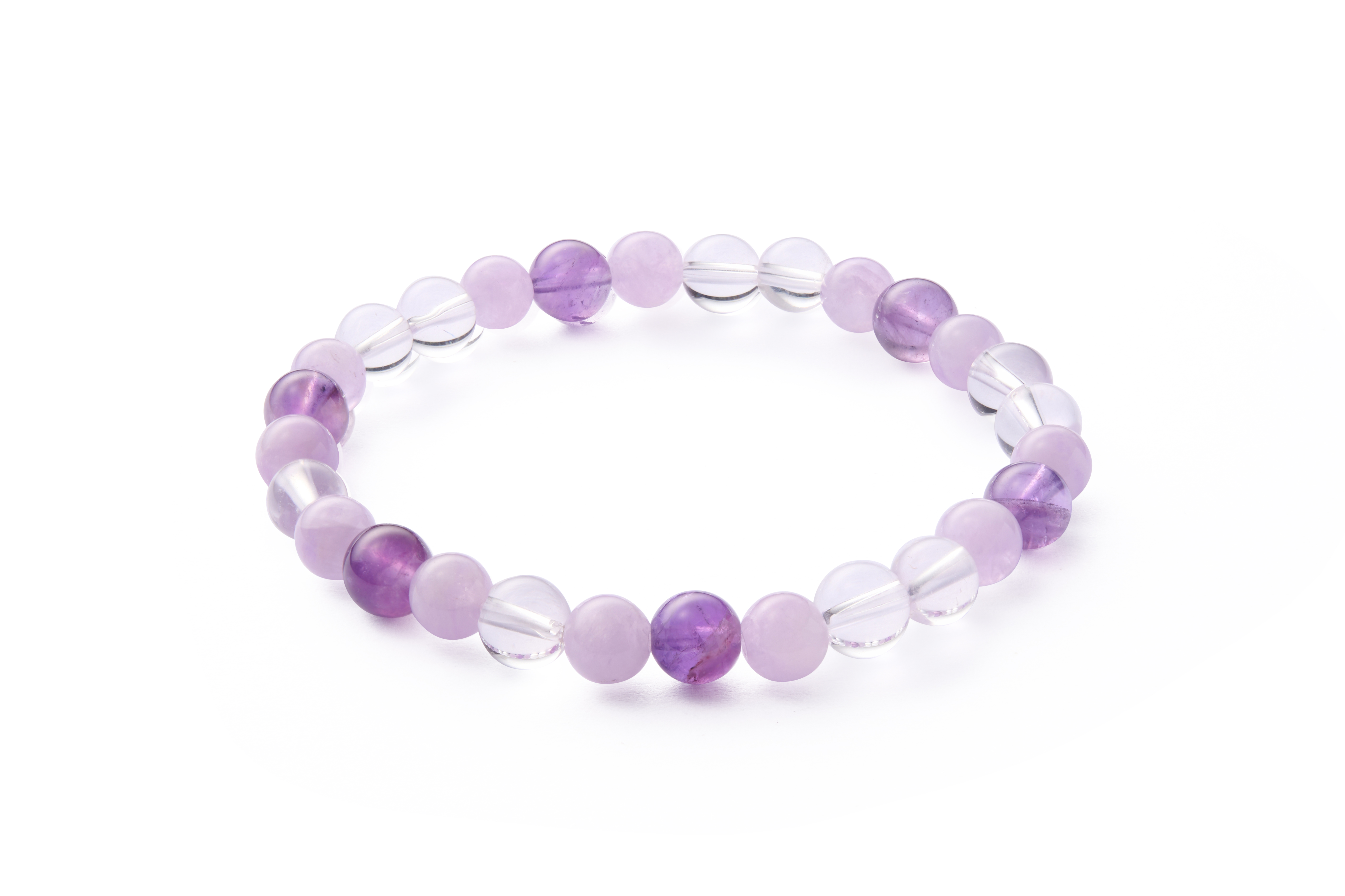 Minimal flat composition with even bead spacing and faceted clear quartz separators, hand-strung