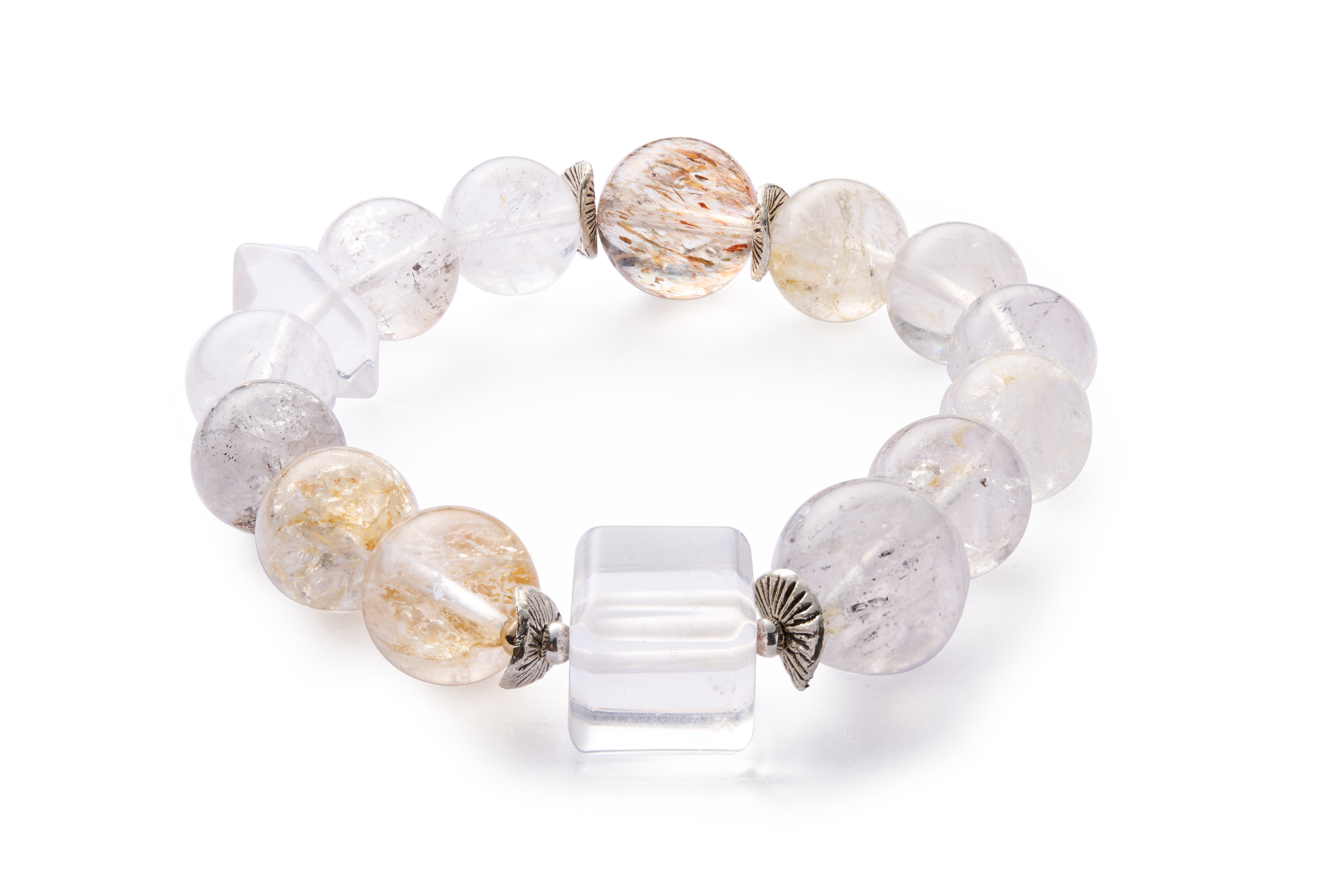 Texture highlight – mixed clear and smoky tones, reflective luster under soft light.