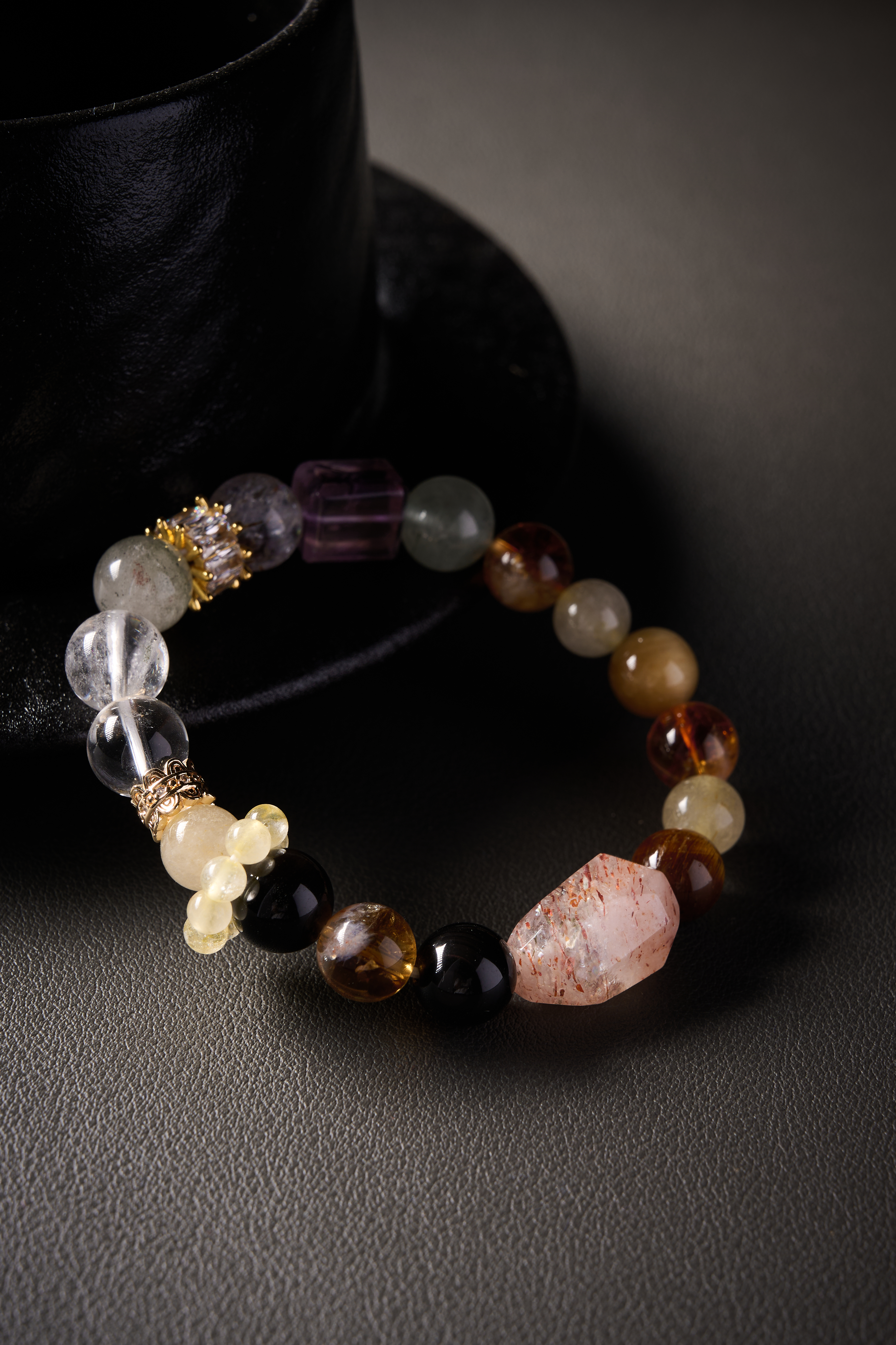 Angle view – full bracelet circle on elastic cord, evenly matched beads, handmade crystal jewelry.