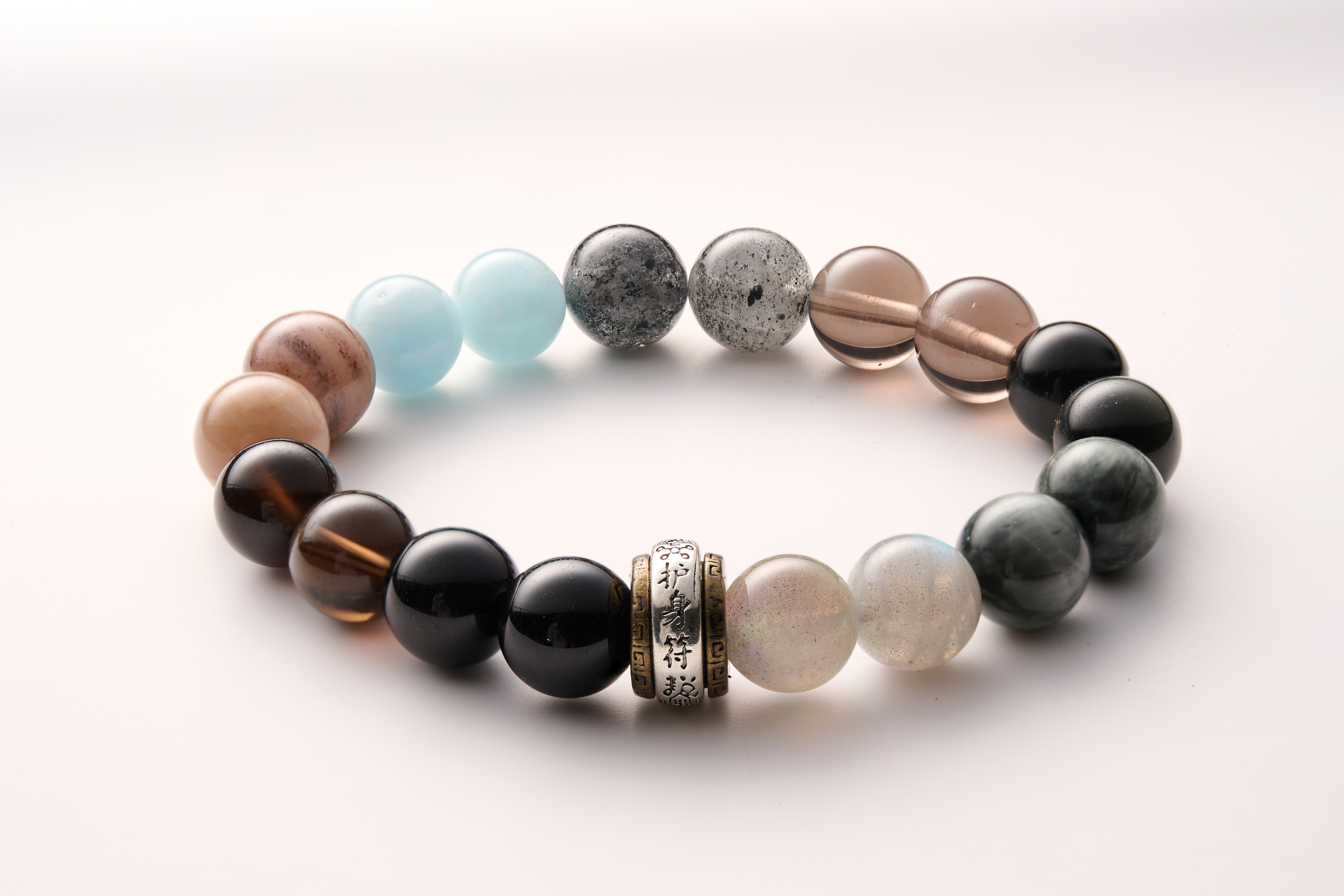 Lifestyle flat lay – minimalist styling of the multi-stone bracelet, suitable for daily wear and gifting.