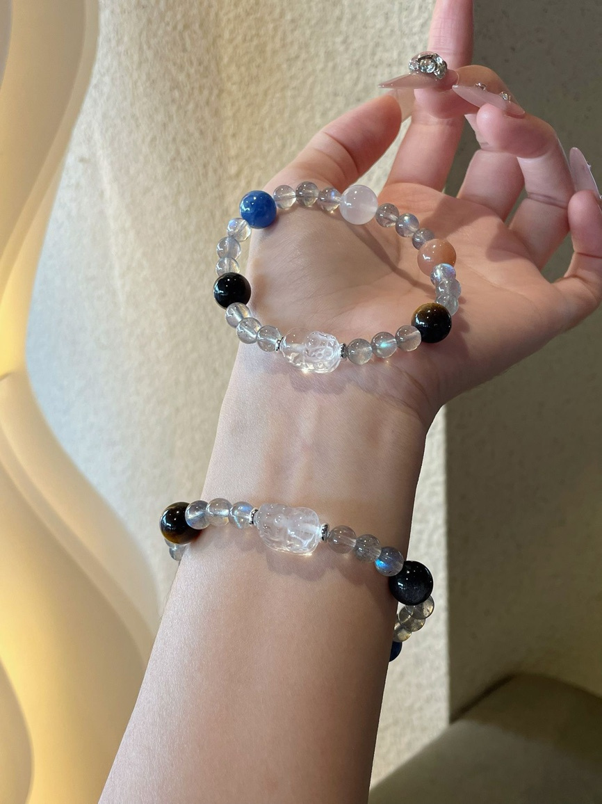 Wrist shot of the gemstone bracelet styled for everyday wear.