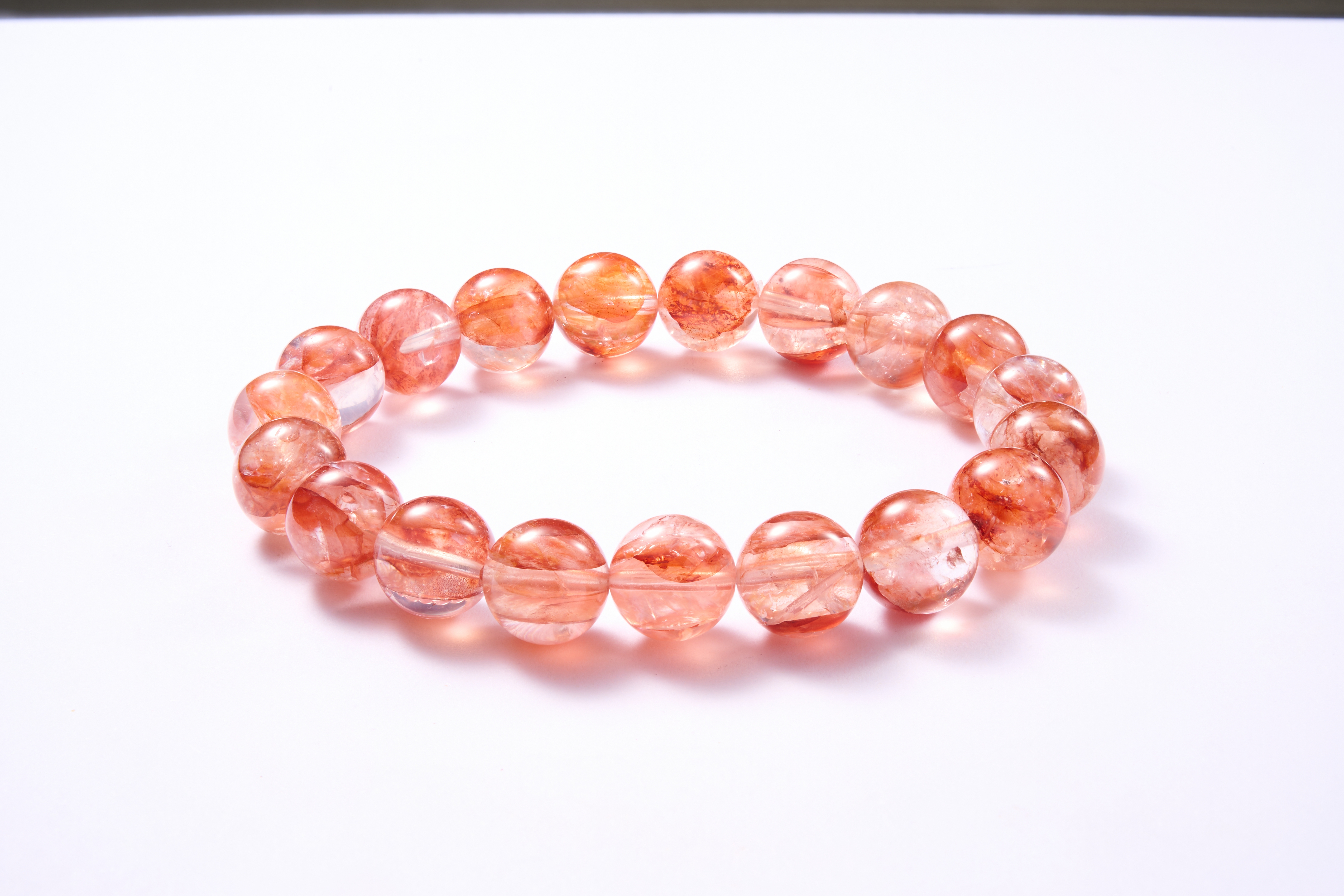 Top-down flat view with even bead spacing and hidden elastic cord, minimalist unisex style