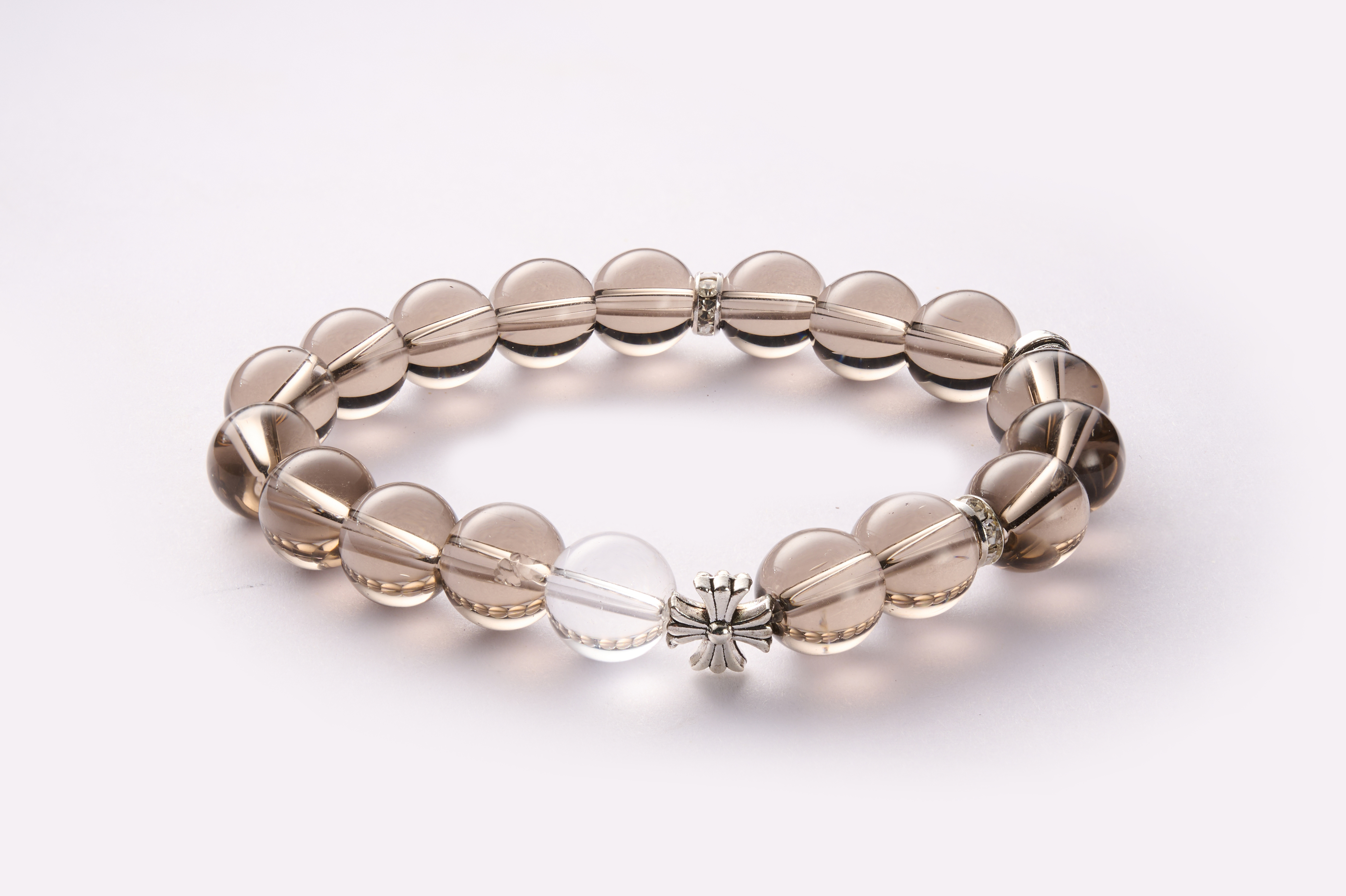 Lifestyle or package display – smoky quartz bracelet with pouch/box, gift-ready presentation.