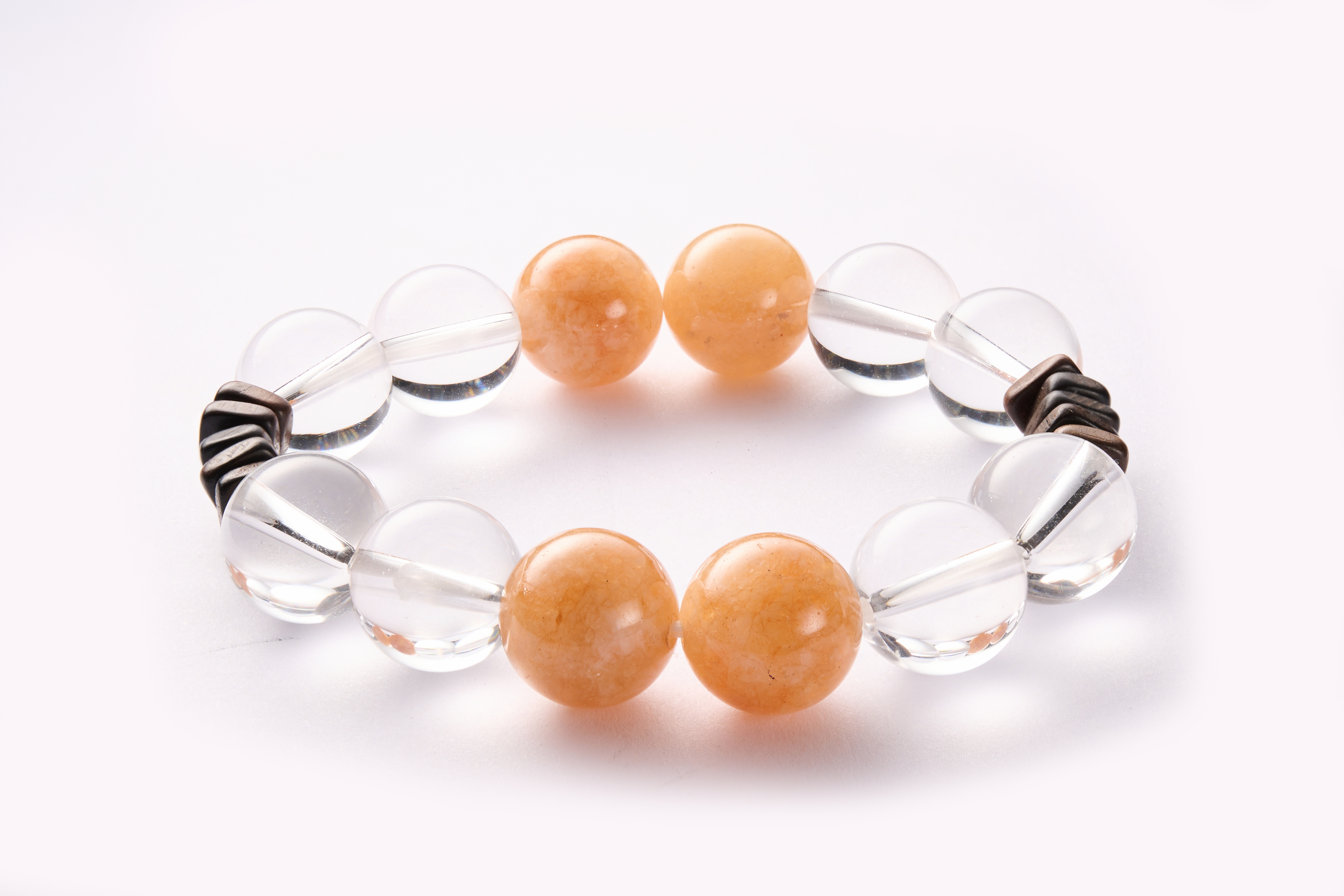 Packaging or clean display – clear quartz & yellow jade bracelet ready for gift presentation.