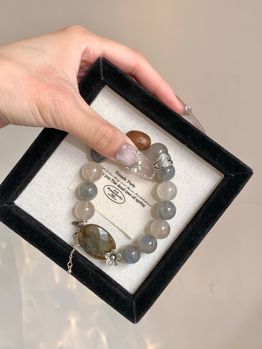 Elegant packaging display of Moonstone and Agarwood crystal bracelet