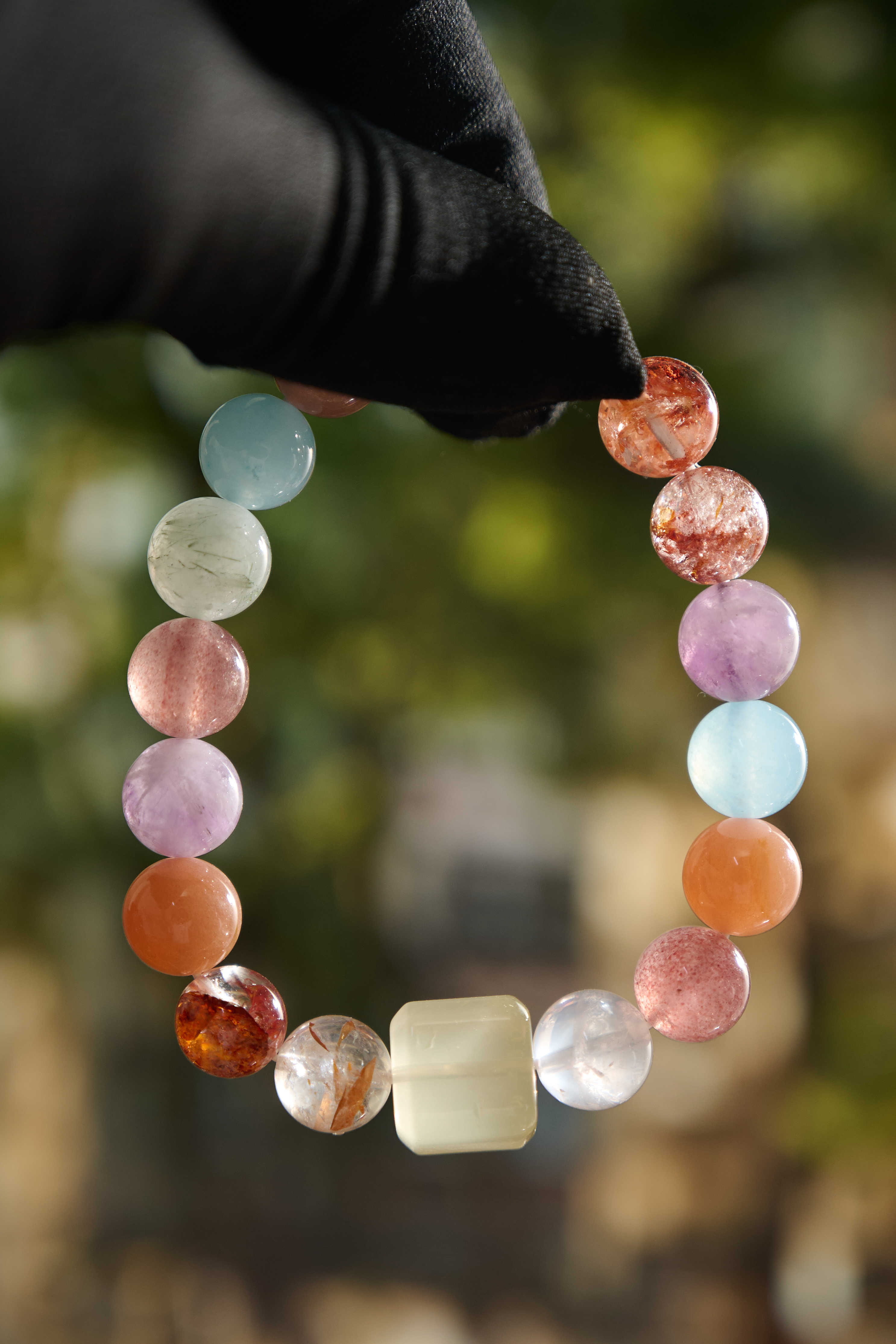 Lifestyle flat lay – colorful gemstone bracelet styled minimally, suitable for daily wear and gifting.