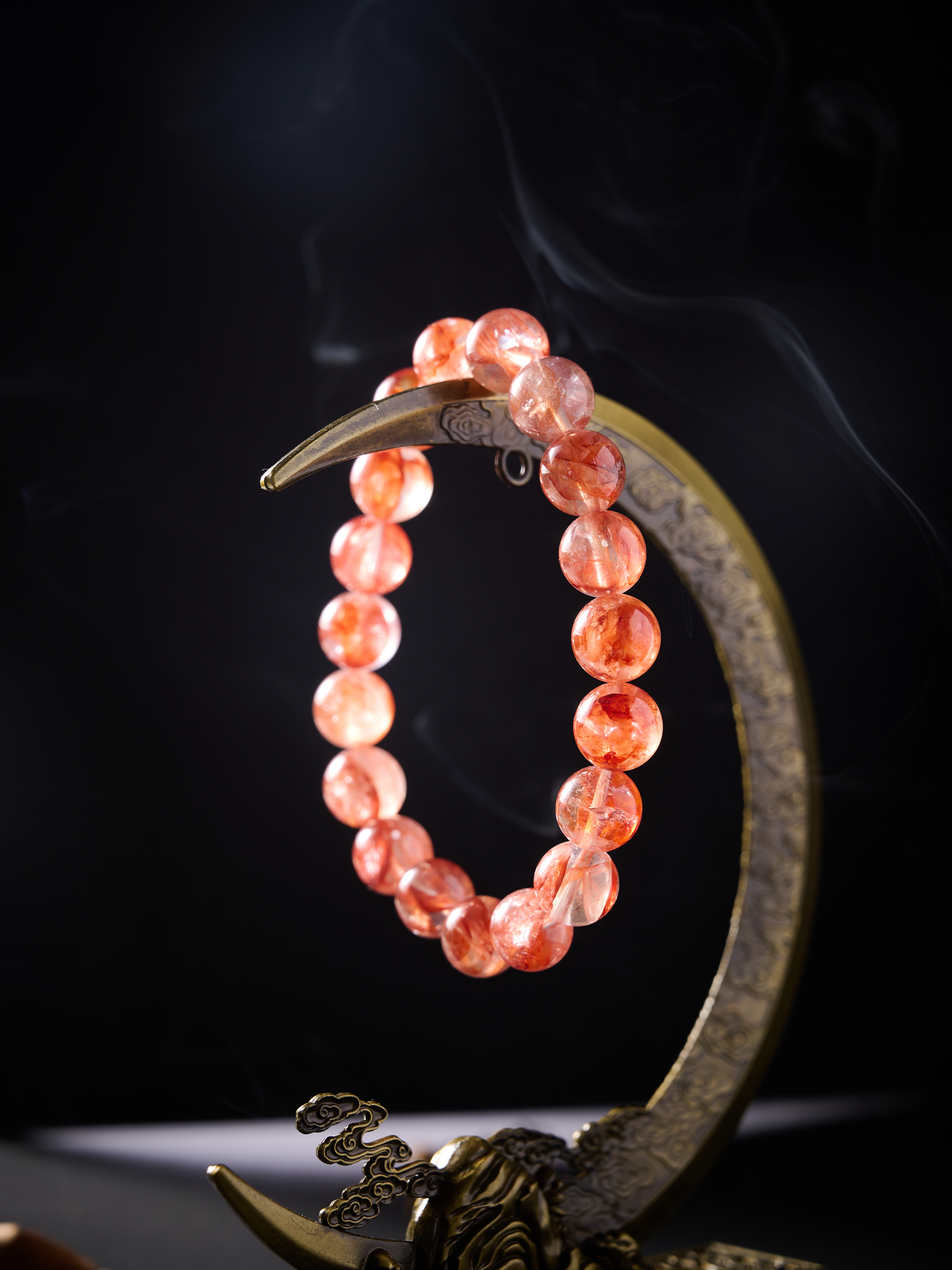 Angled side shot highlighting translucency and internal mineral inclusions, comfortable 16–18 cm fit