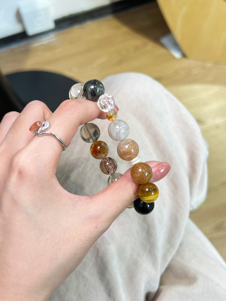 Bracelet glowing under natural sunlight with smoky quartz reflection