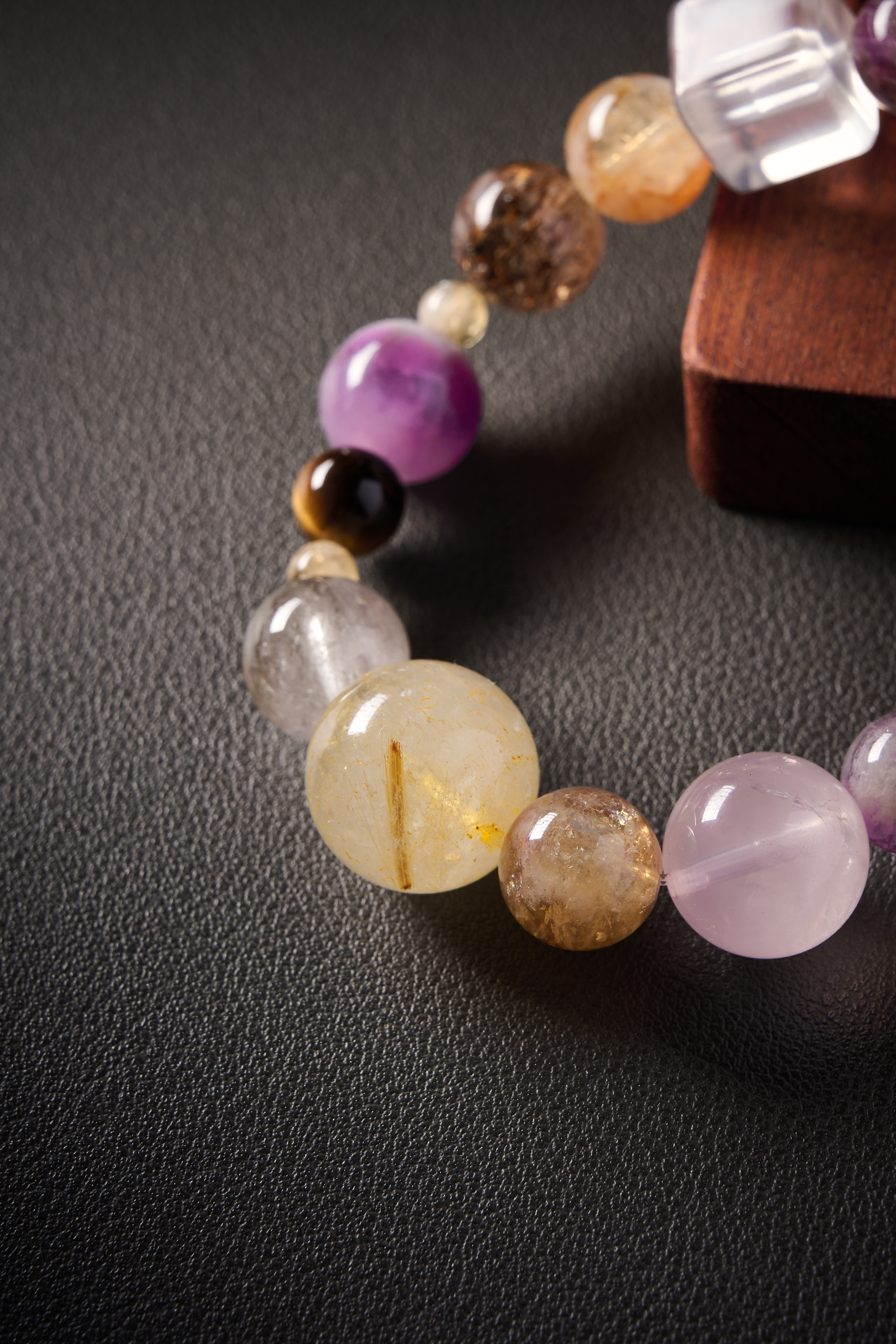 Lifestyle scene – bracelet styled on tabletop with minimal props, everyday wear and gifting vibe.