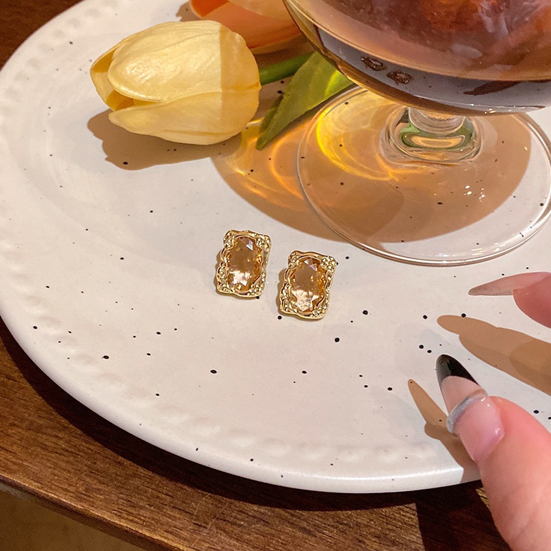 Gold rectangular rhinestone earrings lifestyle display E6818