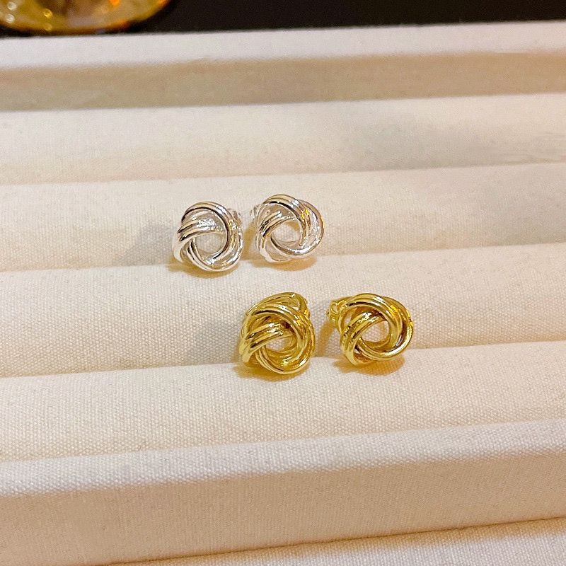 Gold and silver knot earrings product detail