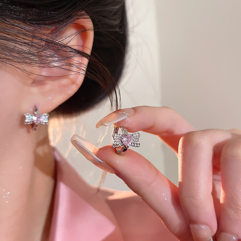 Silver Pink Zircon Bow Hoop Earrings Worn on Ear