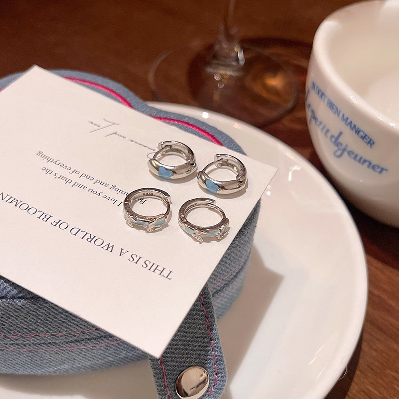 Silver butterfly hoop earrings lifestyle display