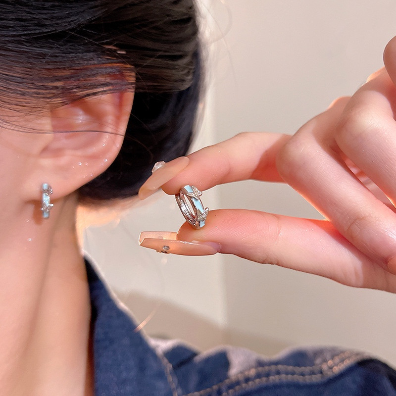 Silver blue butterfly earrings detail display