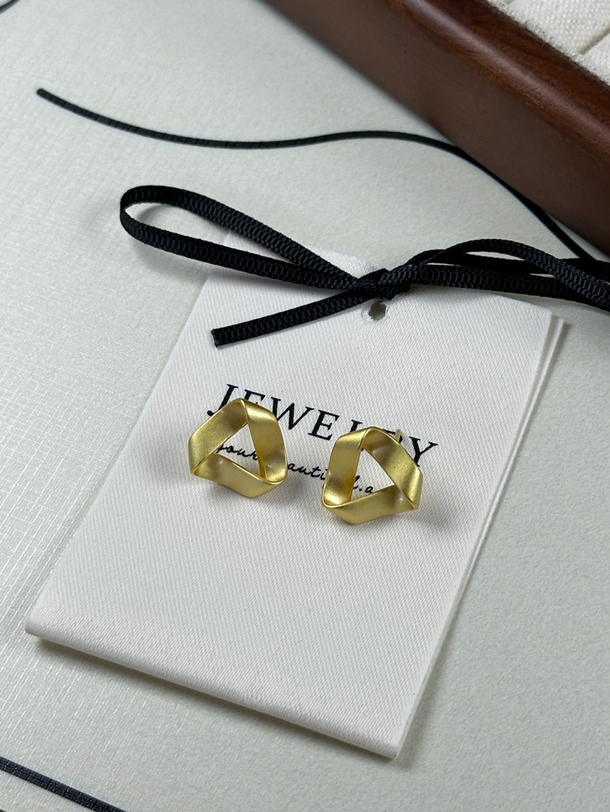 Matte gold twisted geometric earrings