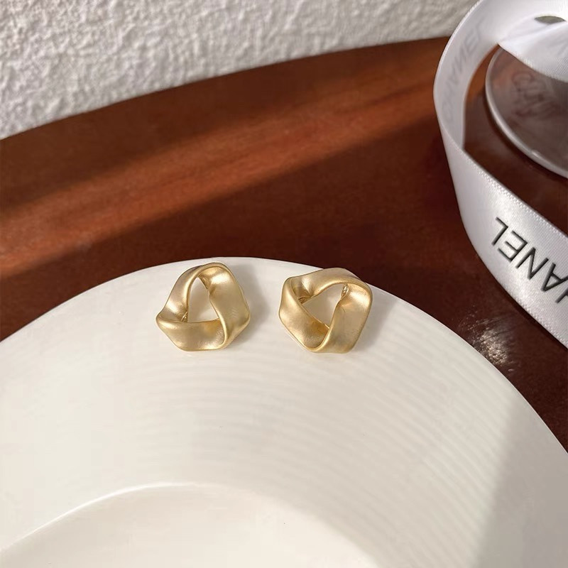 Gold geometric statement earrings