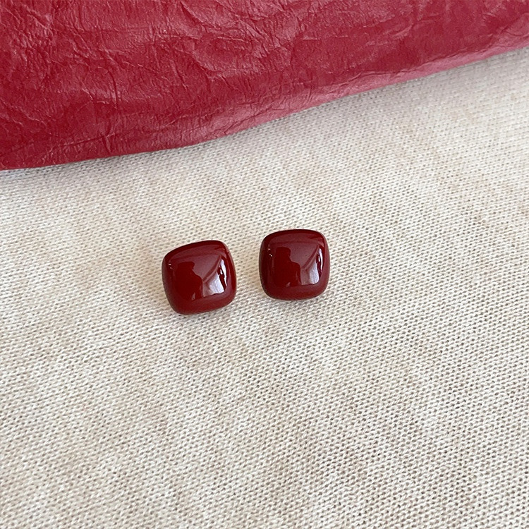 Burgundy square earrings lifestyle display