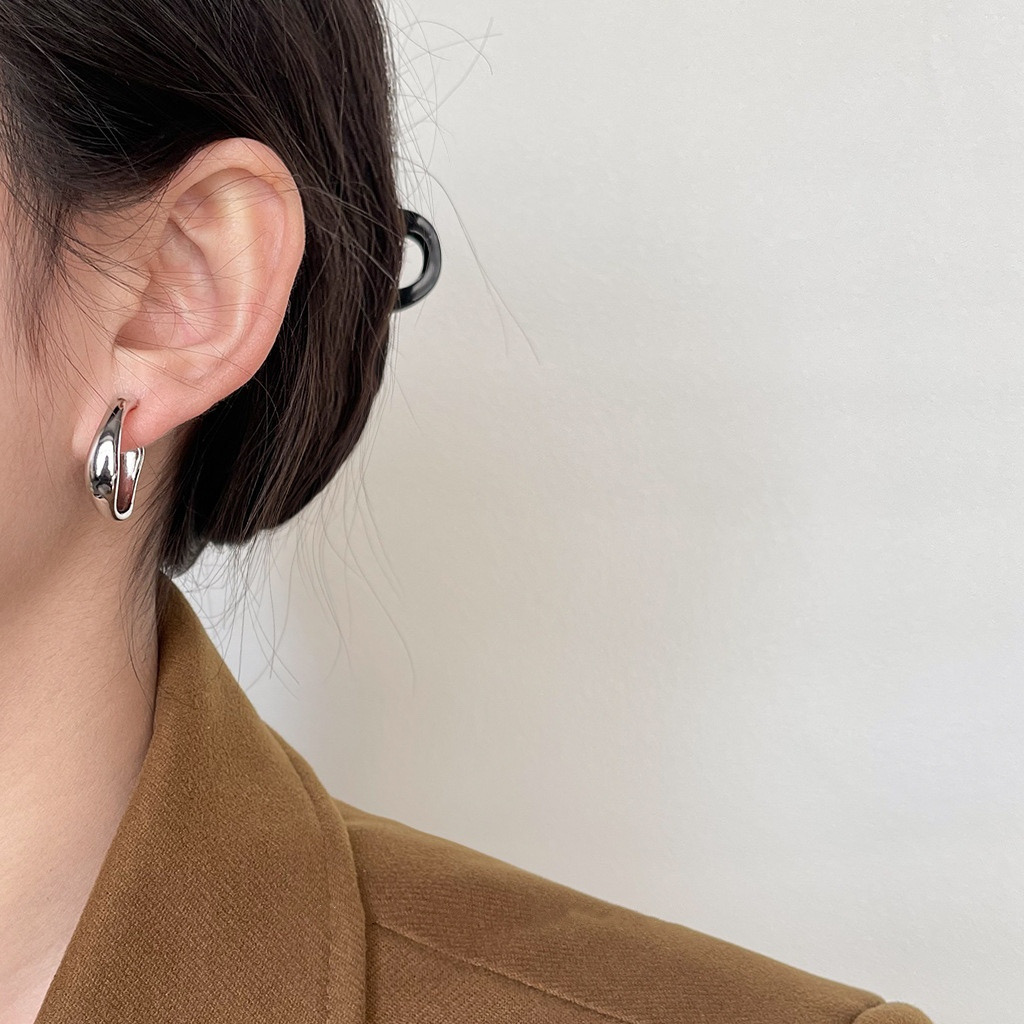 Silver Chunky Hoop Earrings on Ear