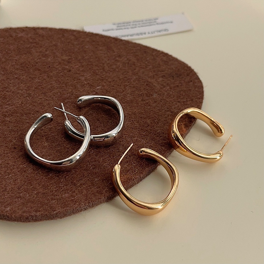 Gold and Silver Hoop Earrings Product Display