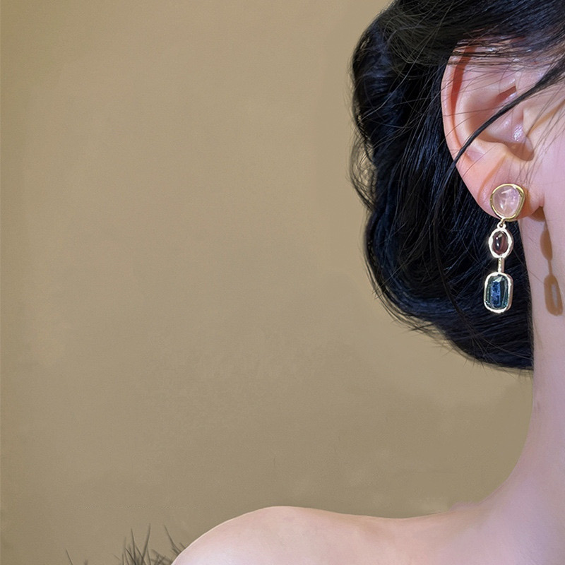 Model Wearing Multicolor Resin Asymmetric Drop Earrings
