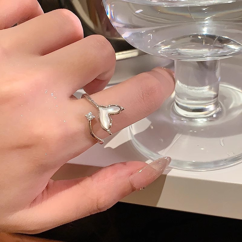 Mother of Pearl Style Whale Tail Open Ring on Finger