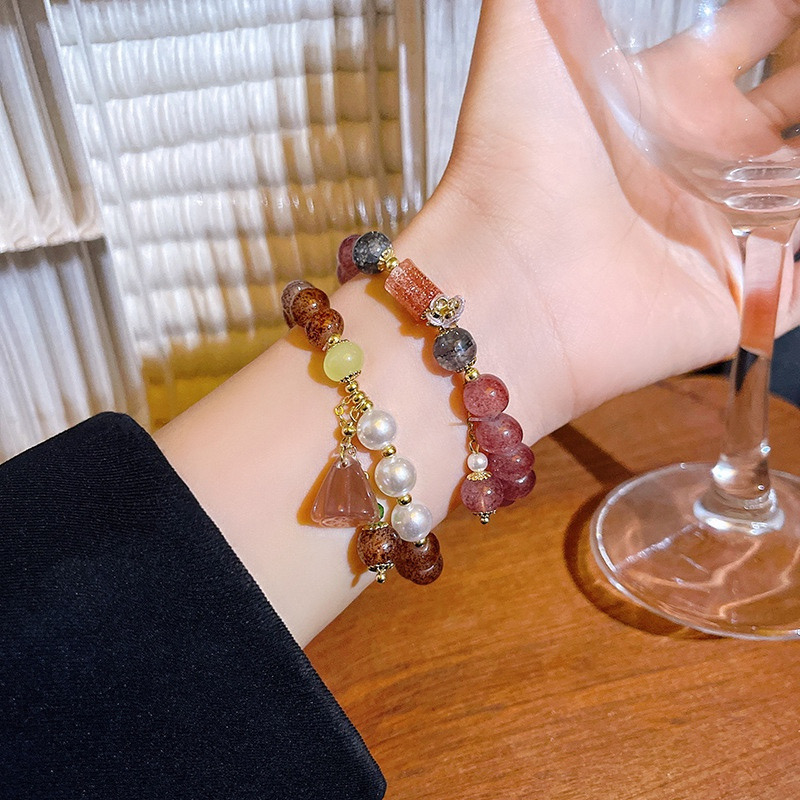 Pink Crystal Beaded Bracelet with Decorative Charm Detail