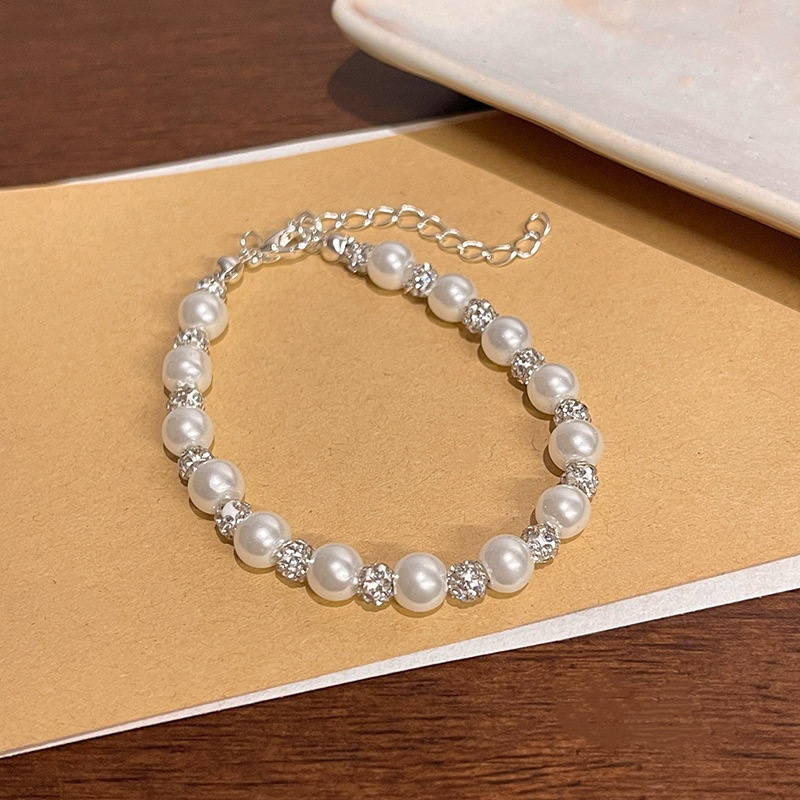 Adjustable White Pearl Bracelet with Crystal Effect Accents