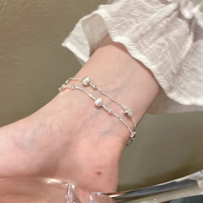 Silver Double Strand Beaded Bracelet on Wrist