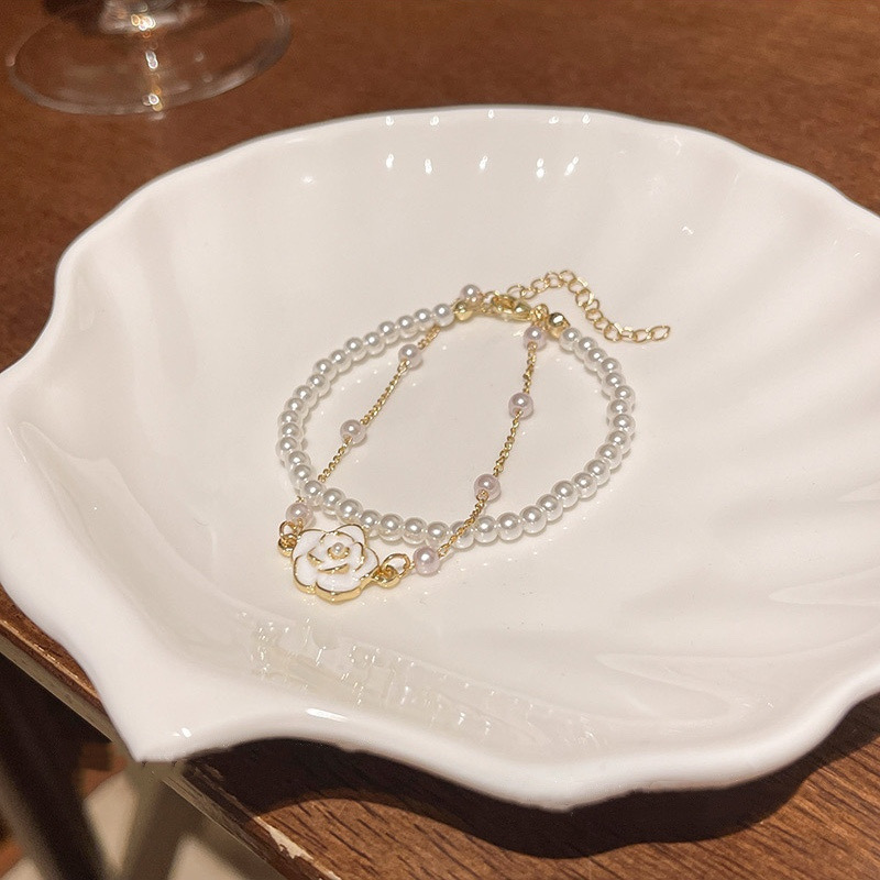 White Faux Pearl Flower Bracelet Flat Lay