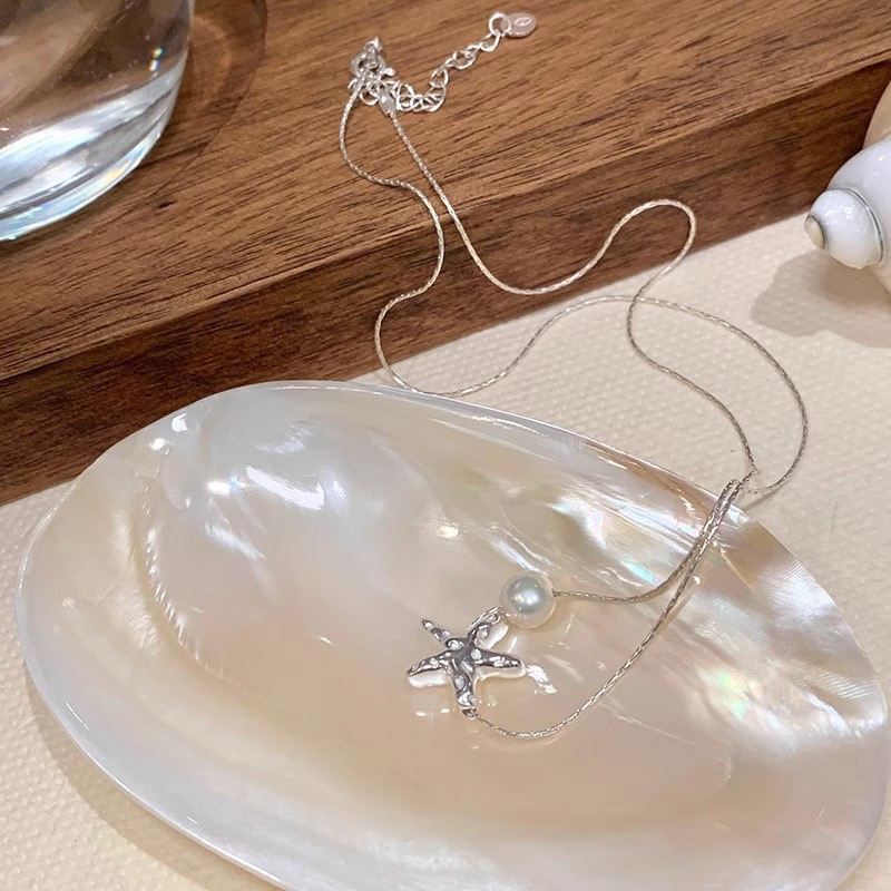 Silver Starfish Faux Pearl Necklace with Adjustable Extension Chain on Shell Dish