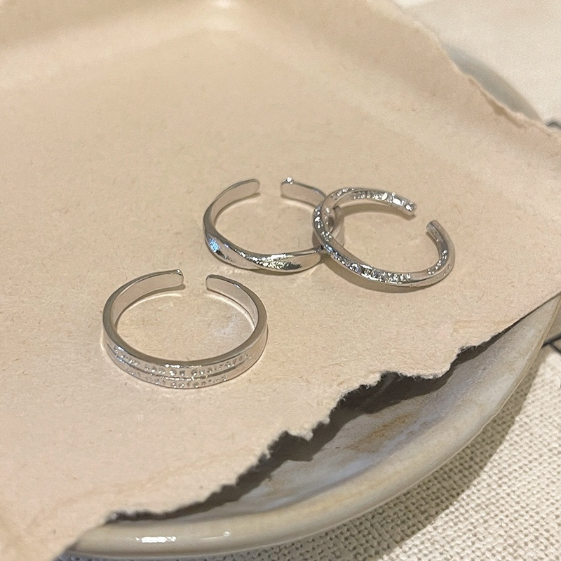 Silver Open Ring Set on Neutral Display