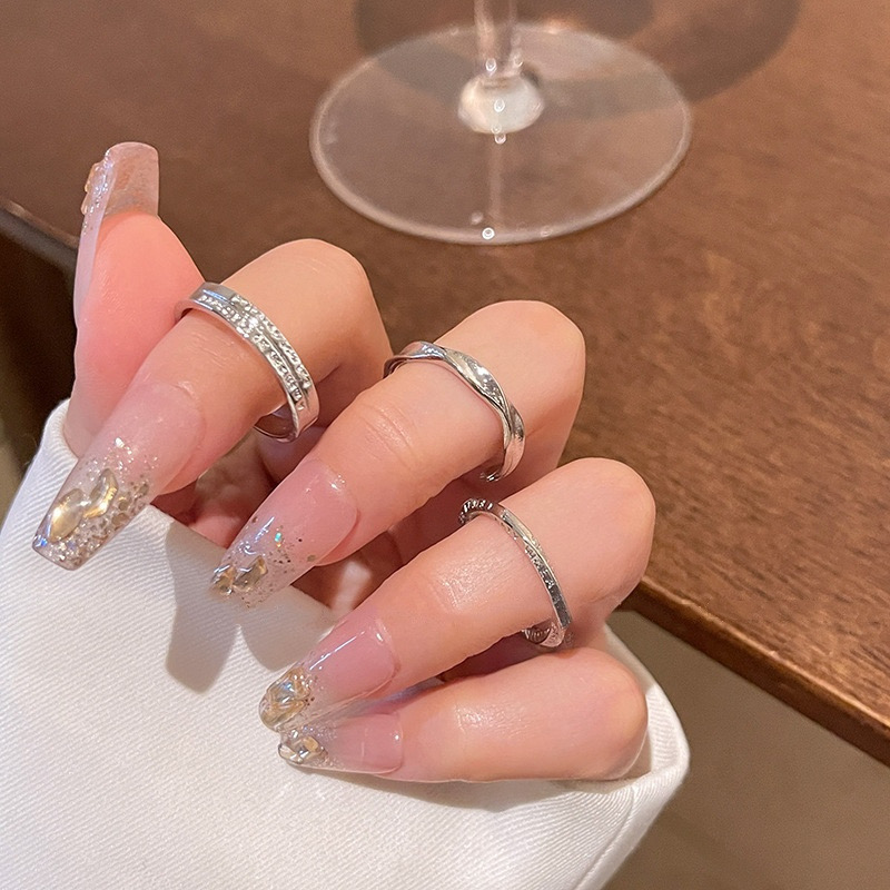 Silver Textured Open Rings Worn on Fingers