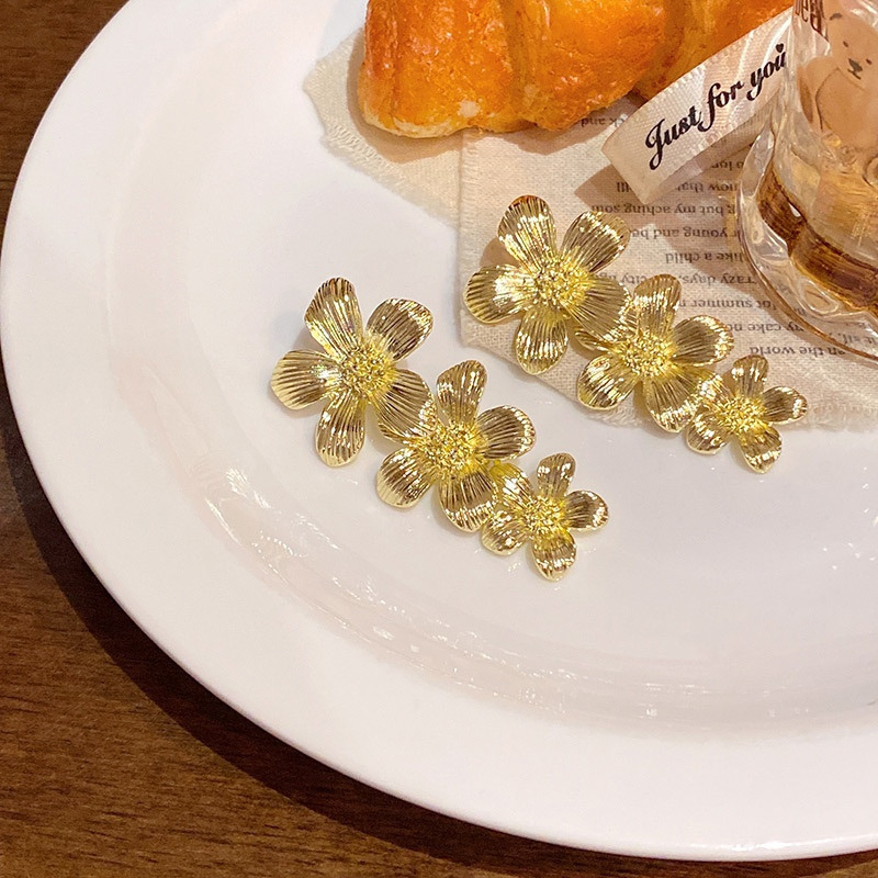 Gold Triple Flower Drop Earrings Product Display