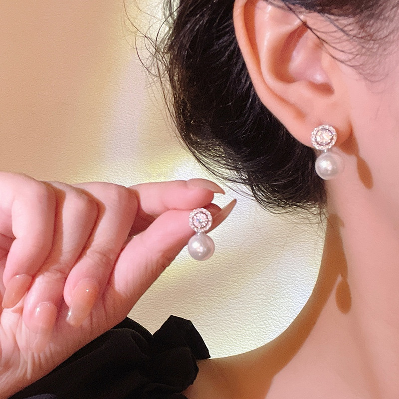 Silver Zircon Pearl Drop Earrings on Model