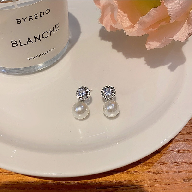 Elegant Silver Pearl Drop Earrings Display