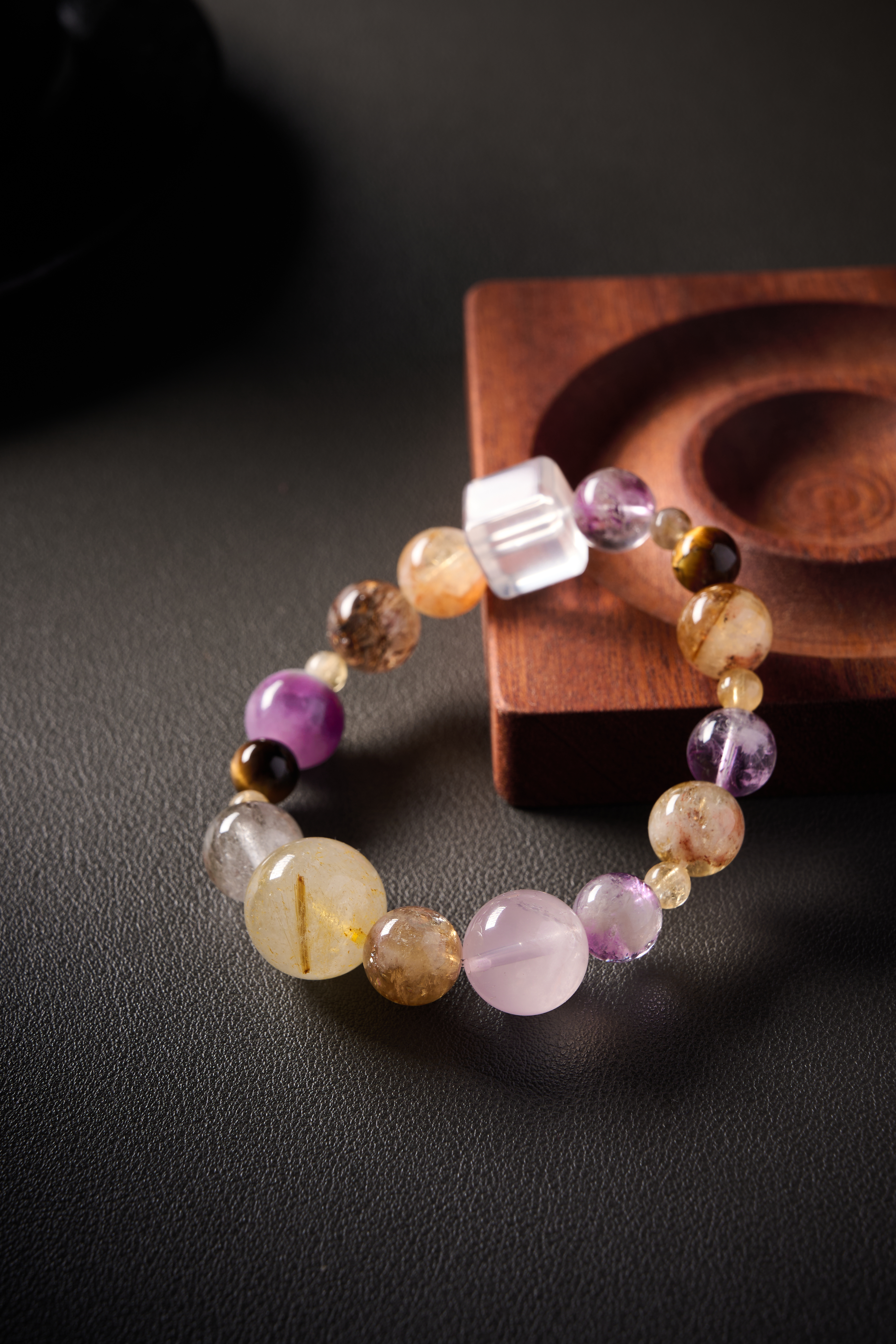 Angle view – full bracelet circle on elastic cord, even bead matching, handmade crystal jewelry.